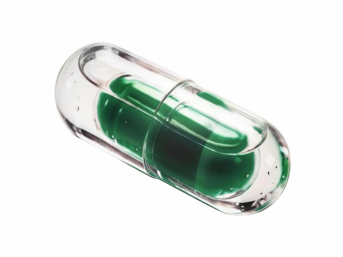 LiquiNova KSM-66® Ashwagandha NovaCap dual capsule on white, one capsule inside another